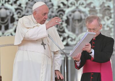 Pope Francis (L) gestures next to Argentinian priest Monsignor Luis Maria Rodrigo Ewart (R) as he leads his traditional Wednesday General Audience in St. Peter Square, in Vatican City, 28 September 2022. EPA / MAURIZIO BRAMBATTI