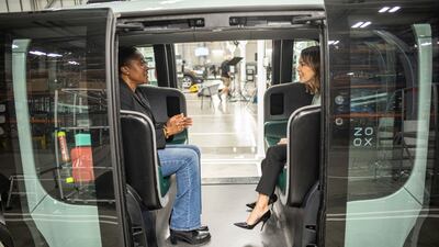 Aicha Evans, chief executive officer of Zoox Inc. , left, speaks during a Bloomberg Studio 1. 0 interview at the company's manufacturing facility in Fremont, California, U. S. , on Thursday, April 7, 2022. Evans discussed the competitive landscape for autonomous vehicles, Zoox's relationship with Amazon, and when riders can expect fully autonomous vehicles to hit the road. Photographer: David Paul Morris / Bloomberg