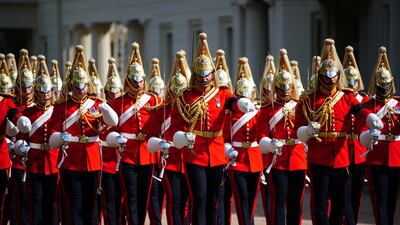 Members of the Life Guards leave Wellington Barracks, central London on September 14, 2022. AFP
