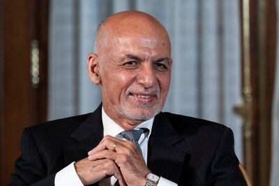 Afghan President Ashraf Ghani is seated after his meeting with President Joe Biden in Washington. AP