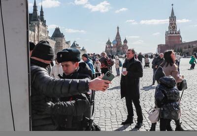 A police officer (2-L) checks a man at the entrance to the Red Square amid tighten security measures in the wake of last week's terrorist attack at the Crocus City Hall concert venue, in Moscow, Russia, on March 27. EPA