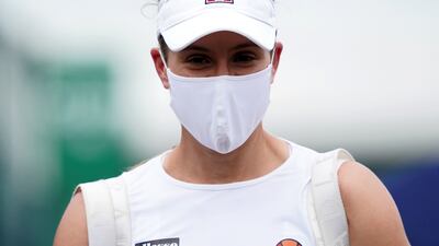 British tennis star Johanna Konta wears a face mask at the Viking Open at Nottingham Tennis Centre, England. PA