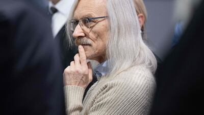 Maximilian Eder, a former army colonel, arrives in court accused of masterminding a conspiracy theory-driven plot to attack the German Parliament and topple the government. AFP