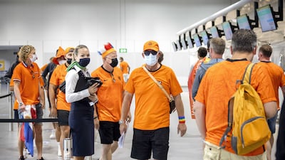 Football fans arrive at Amsterdam Airport Schiphol for their flight to Budapest, near Amsterdam, The Netherlands, 27 June 2021. The Dutch team plays against the Czech Republic in their UEFA EURO 2020 round of 16 soccer match in the Hungarian capital. EPA / RAMON VAN FLYMEN