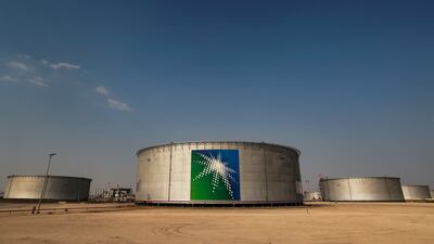 FILE PHOTO: A view shows branded oil tanks at Saudi Aramco oil facility in Abqaiq, Saudi Arabia October 12, 2019. REUTERS / Maxim Shemetov / File Photo