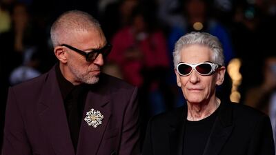 French actor Vincent Cassel, left, and Canadian director David Cronenberg arrive for the screening of The Apprentice at the Cannes Film Festival, southern France. AFP