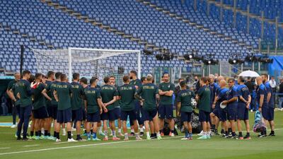 The Italy team create a huddle prior to their training session ahead of their Euro 2020 match against Turkey in Rome earlier in the month. Getty Images