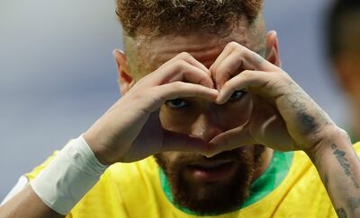 Brazil's Neymar celebrates scoring his side's second goal against Venezuela on a penalty kick during a Copa America soccer match at the National Stadium in Brasilia, Brazil, Sunday, June 13, 2021. (AP Photo / Eraldo Peres)