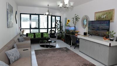 The living room has plenty of natural light.