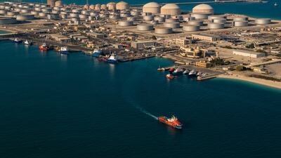 (FILES) In this file handout picture provided by Saudi Aramco on February 11, 2018, shows Saudi Arabia's state-owned oil and gas company's Dhahran oil plants, in eastern Saudi Arabia. - Aramco said today its second quarter profits for 2021 nearly quadrupled compared to the same period last year on the back of higher oil prices. (Photo by AHMAD EL ITANI / Saudi Aramco / AFP) / === RESTRICTED TO EDITORIAL USE - MANDATORY CREDIT "AFP PHOTO / HO / ARAMCO" - NO MARKETING NO ADVERTISING CAMPAIGNS - DISTRIBUTED AS A SERVICE TO CLIENTS ===