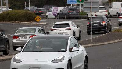 AUCKLAND, NEW ZEALAND - MAY 18: A Tesla electric vehicle is pictured on May 18, 2022 in Auckland, New Zealand. Whilst Finance Minister Grant Robertson will deliver the 2022 Budget on Thursday 19 May, New Zealanders are also having to combat the rising cost of living along with the inflation rate at the highest it has been since 1990. This week the government announced their new emissions plan designed to help more New Zealanders into electric vehicles. (Photo by Phil Walter / Getty Images)