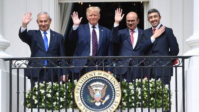 Former Israeli prime minister Benjamin Netanyahu, former US president Donald Trump, Bahrain Foreign Minister Abdullatif Al Zayani and UAE Minister of Foreign Affairs and International Co-operation Abdullah bin Zayed Al Nahyan at the White House after the signing of the Abraham Accords in Washington on September 15, 2020. AFP