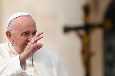 Pope Francis waves he leaves at the end of the weekly general audience on September 28, 2022 at St. Peter's square in The Vatican. (Photo by Andreas SOLARO / AFP)