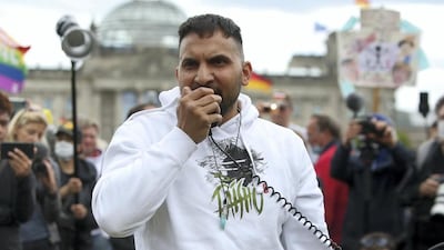 Attila Hildmann speaks at a rally in front of the German parliament in Berlin. Getty Images