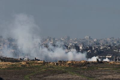 Smoke billows as buildings lie in ruin in Beit Hanoun, in the Gaza Strip, amid the ongoing conflict between Israel and Hamas, as seen from southern Israel, January 8, 2025. REUTERS / Kai Pfaffenbach