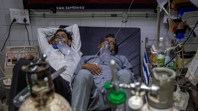 FILE PHOTO: Patients suffering from the coronavirus disease (COVID-19) get treatment at the casualty ward in Lok Nayak Jai Prakash (LNJP) hospital, amidst the spread of the disease in New Delhi, India April 15, 2021. REUTERS / Danish Siddiqui / File Photo To match Special Report AFGHANISTAN-CONFLICT / REUTERS-SIDDIQUI