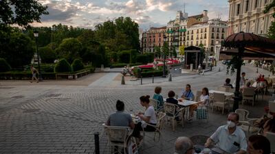 MADRID, SPAIN - JUNE 07: People sit at the terrace of a restaurant at Opera Square on June 07, 2021 in Madrid, Spain. Spain, the world's second most visited tourism destination, has re-opened borders to vaccinated visitors worldwide as well as non-vaccinated Europeans with a negative antigen test. (Photo by Pablo Blazquez Dominguez / Getty Images)