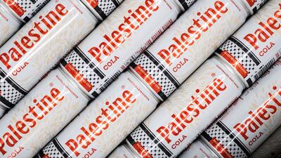 The cans also feature the distinctive Palestinian keffiyeh design at the bottom