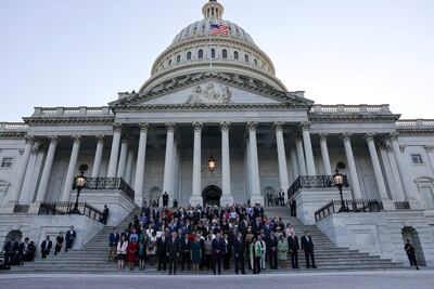 Members of Congress observe a moment of silence for the 600,000 American lives lost, outside the US Capitol in Washington, on June 14, 2021. Reuters