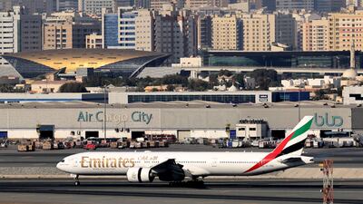 An Emirates plane at Dubai International Airport. AFP
