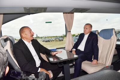 Turkish President Tayyip Erdogan, right, meets with Azerbaijan President Ilham Aliyev in Nagorno-Karabakh. AFP