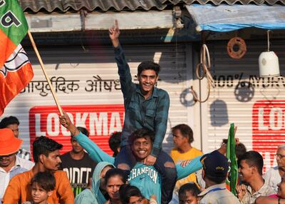 BJP supporters cheer Narendra Modi. Reuters
