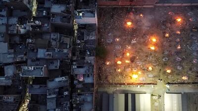 FILE PHOTO: A mass cremation of victims who died due to the coronavirus disease (COVID-19), is seen at a crematorium ground in New Delhi, India, April 22, 2021. Picture taken with a drone. REUTERS / Danish Siddiqui / File Photo To match Special Report AFGHANISTAN-CONFLICT / REUTERS-SIDDIQUI