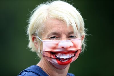 A spectator wears a face mask for finals day at the Viking Classic tennis tournament at Edgbaston Priory Club. Getty