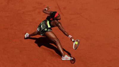 PARIS, FRANCE - JUNE 09: Coco Gauff of The United States returns a backhand during her Ladies Singles Quarter-Final match against Barbora Krejcikova of Czech Republic on Day Eleven of the 2021 French Open at Roland Garros on June 09, 2021 in Paris, France. (Photo by Adam Pretty / Getty Images)