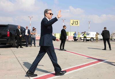 US Secretary of State Antony Blinken gestures in Tel Aviv as he departs for Egypt on August 20, 2024. Blinken heads to Egypt on August 20 before a stop in Qatar, the two countries brokering negotiations, in what he said may be a "last opportunity" to secure a Gaza truce and hostage release deal in the 10-month Gaza conflict. (Photo by Kevin MOHATT / POOL / AFP)
