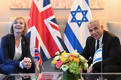 British Prime Minister Liz Truss and Israeli Prime Minister Yair Lapid hold a bilateral meeting as they attend the 77th U. N. General Assembly in New York, Wednesday, Sept. 21, 2022. (Toby Melville / Pool Photo via AP)