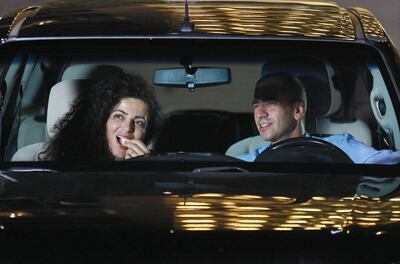 Jordanians sit in their cars at their country's second drive in cinema, in al-Abdali park in Amman, as part of the Amman International Film Festival. AFP