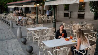 MADRID, SPAIN - JUNE 07: Women sit at the terrace of a restaurant at Opera Square on June 07, 2021 in Madrid, Spain. Spain, the world's second most visited tourism destination, has re-opened borders to vaccinated visitors worldwide as well as non-vaccinated Europeans with a negative antigen test. (Photo by Pablo Blazquez Dominguez / Getty Images)