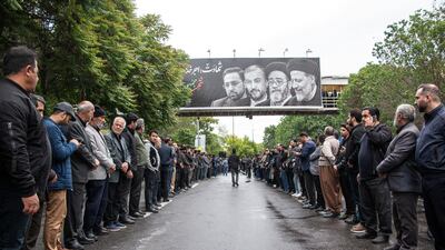 People attend a funeral ceremony for the late Iranian President Ebrahim Raisi in Tabriz, East Azerbaijan province, Iran. Reuters