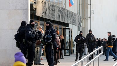 Police officers keep watch outside the Oktyabrsky Concert Hall, amid heightened security measures in the wake of a terrorist attack at the Crocus City Hall concert venue, prior to the concert of the rock group 'Picnic' in St. Petersburg, Russia. EPA