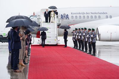 Dutch King Willem-Alexander (L) and Queen Maxima arrive at the military part of the Berlin Brandenburg Airport (BER) in Schoenefeld, Germany, 05 July 2021. The Dutch Royal Couple is on a three day visit to Berlin. EPA / CLEMENS BILAN