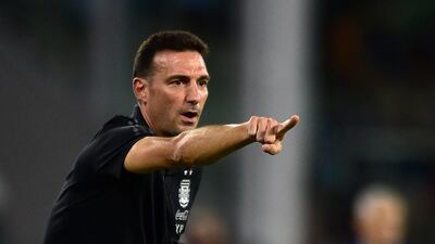 FILE - Argentina's coach Lionel Scaloni gives instructions to his players during a qualifying soccer match for the FIFA World Cup Qatar 2022 against Colombia at Mario Alberto Kempes stadium in Cordoba, Argentina, Tuesday, Feb. 1, 2022. (AP Photo / Gustavo Garello, File)