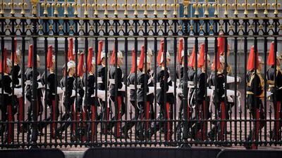 Soldiers from The Blues and Royals march inside the courtyard of Buckingham Palace on September 14, 2022. AFP