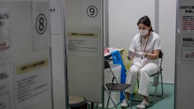 TOKYO, JAPAN - JUNE 08: A nurse waits to process people arriving to receive coronavirus vaccine at the Tsukiji Vaccination Center on June 08, 2021 in Tokyo, Japan. Tokyo Metropolitan Government newly opened a mass vaccination center on Tuesday, June 8, 2021 at the former Tsukiji Fish Market, also soon-to-be the transportation hub during the Tokyo 2020 Olympic Games. The center aims to inoculate the employees of Tokyo Police Department and Fire Department, as well as registered Judo therapists, operated by approximately 60 dentists and nurses with the maximum of 5000 shots per day before the Olympic starts in late July. (Photo by Yuichi Yamazaki / Getty Images)
