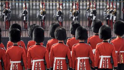 Grenadier Guards form up outside Buckingham Palace on September 14, 2022. AFP