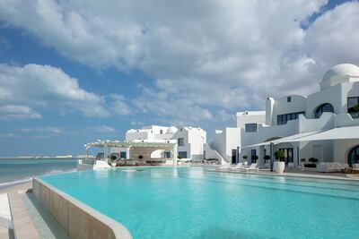 Anantara Santorini Abu Dhabi Retreat - Perissa Beach. Photo: Anantara Santorini