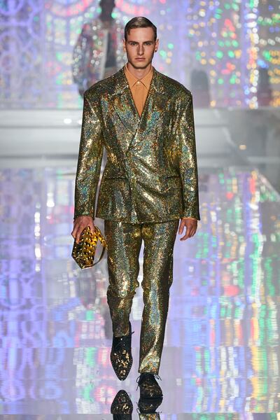 Dolce & Gabbana shift the button on this jacket to create a new shape for spring / summer 2022