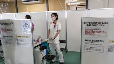 TOKYO, JAPAN - JUNE 08: A nurse waits to process people arriving to receive coronavirus vaccine at the Tsukiji Vaccination Center on June 08, 2021 in Tokyo, Japan. Tokyo Metropolitan Government newly opened a mass vaccination center on Tuesday, June 8, 2021 at the former Tsukiji Fish Market, also soon-to-be the transportation hub during the Tokyo 2020 Olympic Games. The center aims to inoculate the employees of Tokyo Police Department and Fire Department, as well as registered Judo therapists, operated by approximately 60 dentists and nurses with the maximum of 5000 shots per day before the Olympic starts in late July. (Photo by Yuichi Yamazaki / Getty Images)