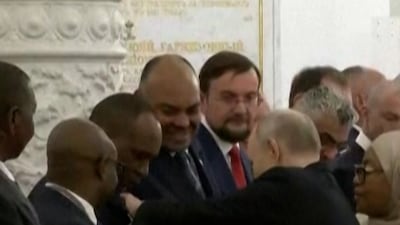 Let me fix that: Putin straightens Tanzanian minister's tie